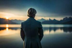 un mujer en un traje soportes por un lago a puesta de sol. generado por ai foto