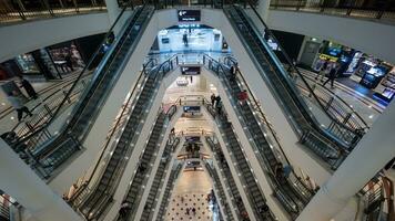 People traffic in multistorey trade centre photo