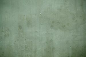 Grunge vintage style green painted wall background photo