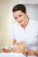 Anti-aging treatment  at beauty salon photo