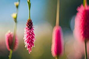 pink flowers hanging from the stems of grass. AI-Generated photo