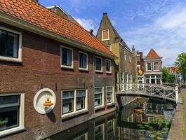 Canal in Gouda, Netherlands photo