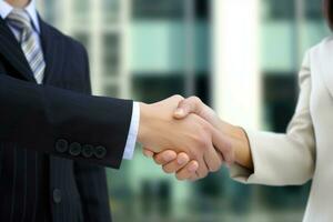Business people shaking hands, finishing up a meeting. Business success concept photo