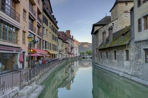 Quai de l'Ile and canal in Annecy old city, France, HDR photo
