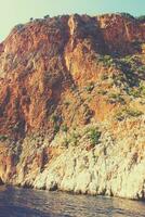 Mediterranean landscape and rocks in the Turkish city of Alanya on a warm summer afternoon photo