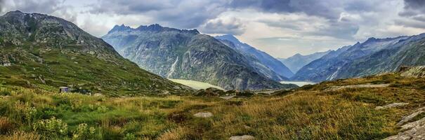 View on Hasli valley from Grimselpass, Bern canton, Switzerland photo