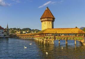 Kapellbrucke Chapel covered Bridge and Water Tower in Luzern, Switzerland photo