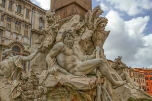 Fountain of the Four Rivers, Fontana dei Quattro Fiumi, in Piazza Navona, Rome, Italy photo