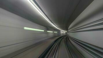 Subway rails in tunnel photo