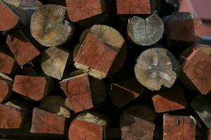 Structure of red stacked wood boards. photo