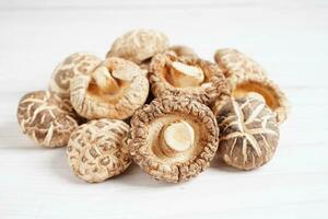 Dried shiitake mushroom isolated on white background with clipping path, healthy food. photo