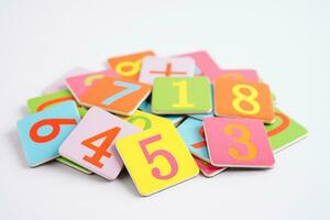 Number wood block cubes for learning Mathematic, education math concept. photo