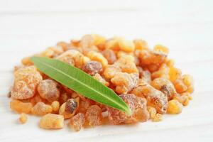 Frankincense or olibanum aromatic resin used in incense and perfumes. photo