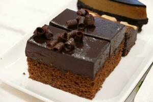 Mini cakes with chocolate and cheesecake photo
