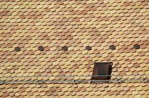 Roof tiles and window photo