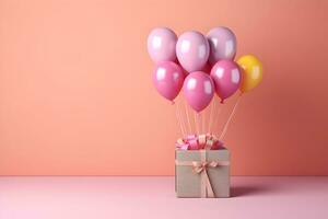 Colorful balloons bunch tied with a gift box on a pink wall background with copy space. Birthday, wedding, party or celebration concept. Generated AI. photo
