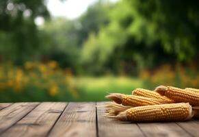 Wooden table with corn on cobs and free space on nature blurred background. Generated AI. photo