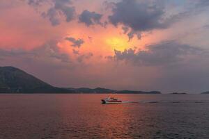 Sunset by summer holydays at the sea, Srebreno, Croatia photo