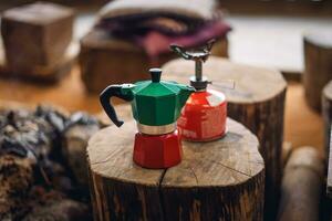 Moka pot coffee on a portable gas stove photo