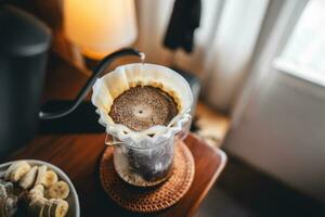 Coffee and breakfast on the desk photo