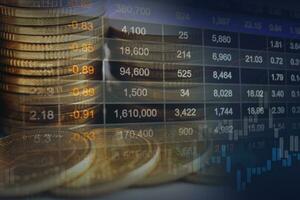 Stock market investment trading financial, coin and graph chart or Forex for analyze profit finance business trend data background. photo