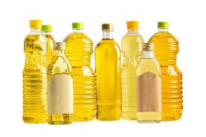 Vegetable oil with olive oil in different bottle for cooking isolated on white background with clipping path. photo