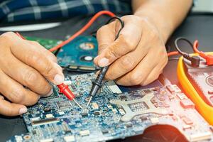 Repairing and upgrade circuit mainboard of notebook, electronic, computer hardware and technology concept. photo