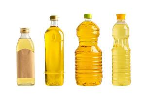 Vegetable oil with olive oil in different bottle for cooking isolated on white background with clipping path. photo