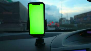 Phone green screen in car. Smartphone green screen on car video