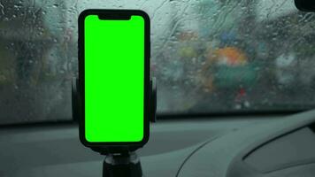 Phone green screen in car. Smartphone green screen on car video