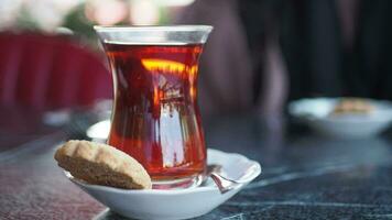 Traditional turkish tea on white table . video