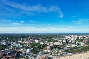 Attractive Tourist Destination at Bournemouth City Sandy Beach and Ocean of England Great Britain, Aerial Footage Captured with Drone's Camera on August 23rd, 2023 During sunny Day. photo