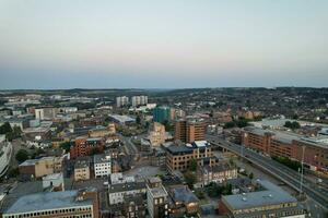 Aerial View of Downtown Buildings, Roads and Central Luton City of England UK at Beginning of Clear Weather Night of September 5th, 2023 photo