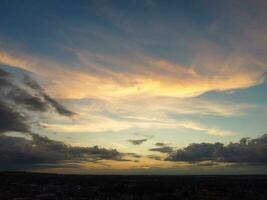 High Angle view of Beautiful Clouds and Sky over Luton City During Sunset photo