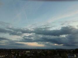 High Angle view of Beautiful Clouds and Sky over Luton City During Sunset photo