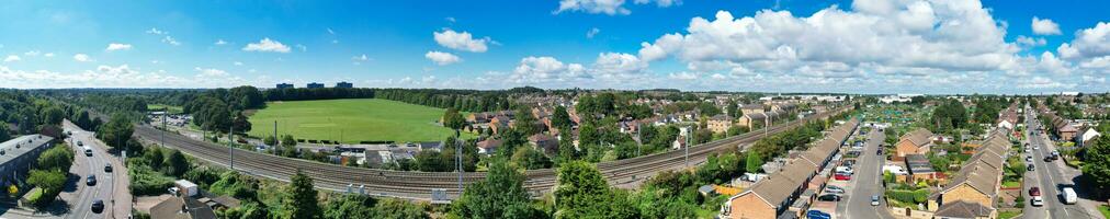 Aerial Wide Angle Panoramic View of North Luton City Residential Estate of England Great Britain UK. The High Angle Footage Was Captured with Drone's Camera on August 15th, 2023 photo