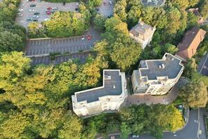 Aerial View of British Tourist Attraction of Bournemouth Beach and Sea view City of England Great Britain UK. Image Captured with Drone's Camera on September 9th, 2023 During Sunset photo