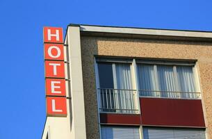 Hotel sign on building photo