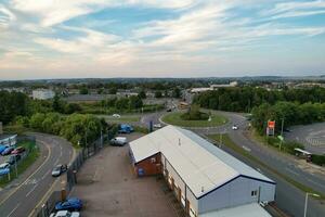 Aerial View of Residential Real Estate with Industrial Estate Combined District of North of Luton City of England, Great Britain, UK.  Footage Was Captured with Drone's Camera on September 7th, 2023 photo