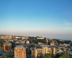 Aerial Panoramic View of British Tourist Attraction at Sea View of Bournemouth City of England Great Britain UK. High Angle Image Captured with Drone's Camera on September 9th, 2023 During Sunset photo