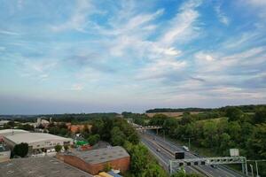 Aerial View of Residential Real Estate with Industrial Estate Combined District of North of Luton City of England, Great Britain, UK.  Footage Was Captured with Drone's Camera on September 7th, 2023 photo