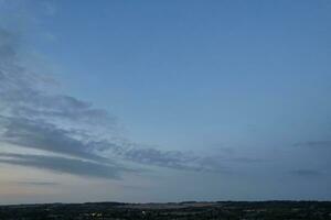 Most Beautiful View of Sky and Dramatic Clouds over Luton City of England UK During Sunset. photo