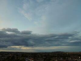 High Angle view of Beautiful Clouds and Sky over Luton City During Sunset photo