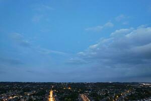 Aerial View of Illuminated Luton's  Residential Homes of England UK after Sunset During Night of Summer. Footage Was Captured with Drone's Camera on Sep 2nd, 2023 photo