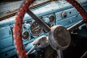 Classic, vintage dash with visible instrument cluster of a old truck from late 70s photo