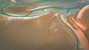 Aerial view of low tide with visible river bed by the beach Llanfairfechan, North Wales, Cymru, UK photo