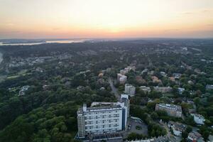 Aerial View of British Tourist Attraction of Bournemouth Beach and Sea view City of England Great Britain UK. Image Captured with Drone's Camera on September 9th, 2023 During Sunset photo