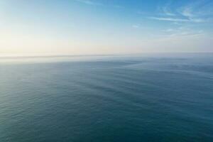 Most Beautiful View of British Landscape and Sea View of Durdle Door Beach of England Great Britain, UK. Image Was captured with Drone's camera on September 9th, 2023 photo