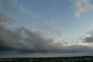 Most Beautiful View of Sky and Dramatic Clouds over Luton City of England UK During Sunset. photo