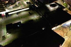 Aerial View of Illuminated Downtown Buildings, Roads and Central Luton City of England UK at Beginning of Clear Weather Night of September 5th, 2023 photo